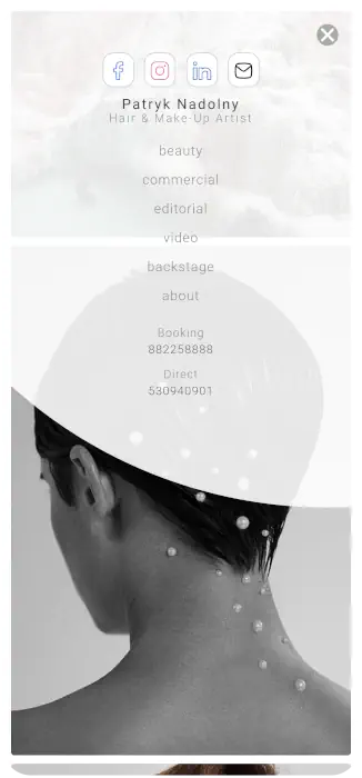 Telefon z screenem strony PatrykNadolny.pl